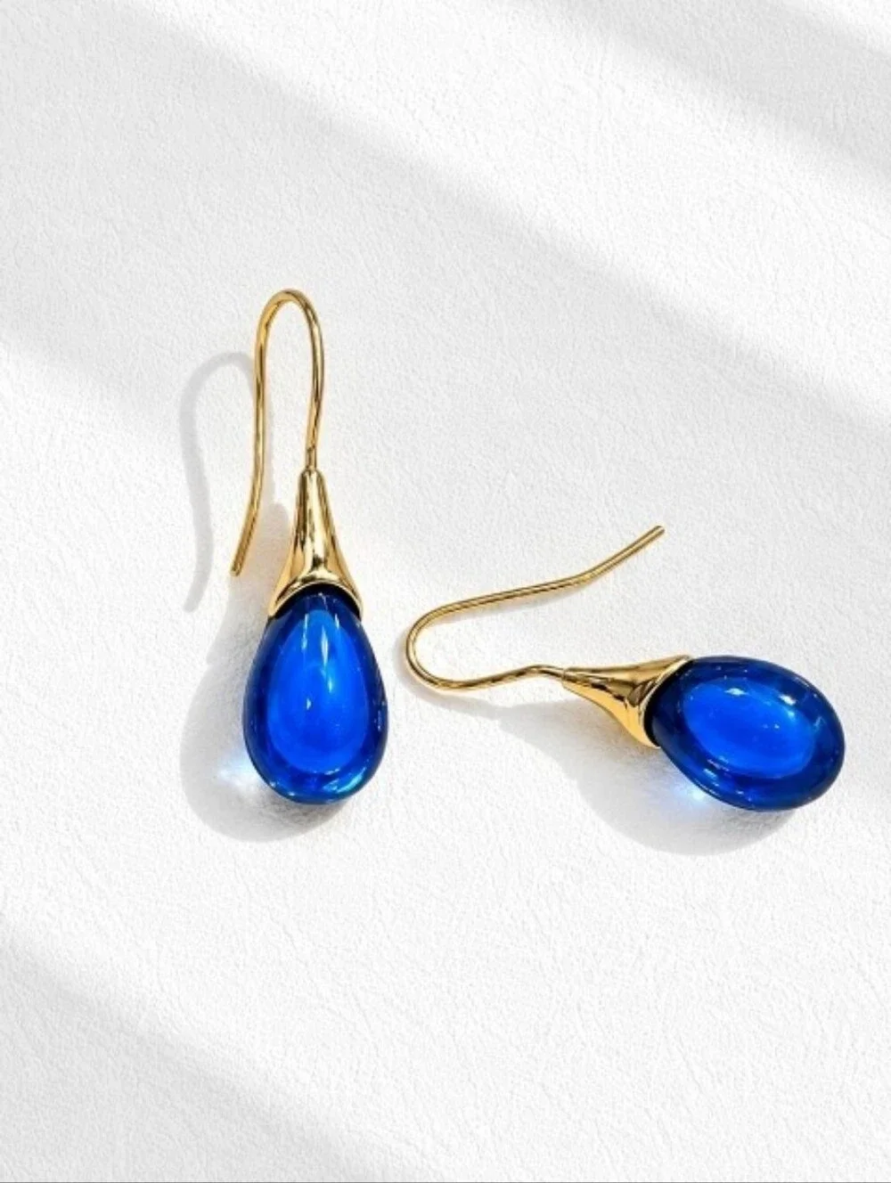 Gold Earrings with Blue Teardrop Stones